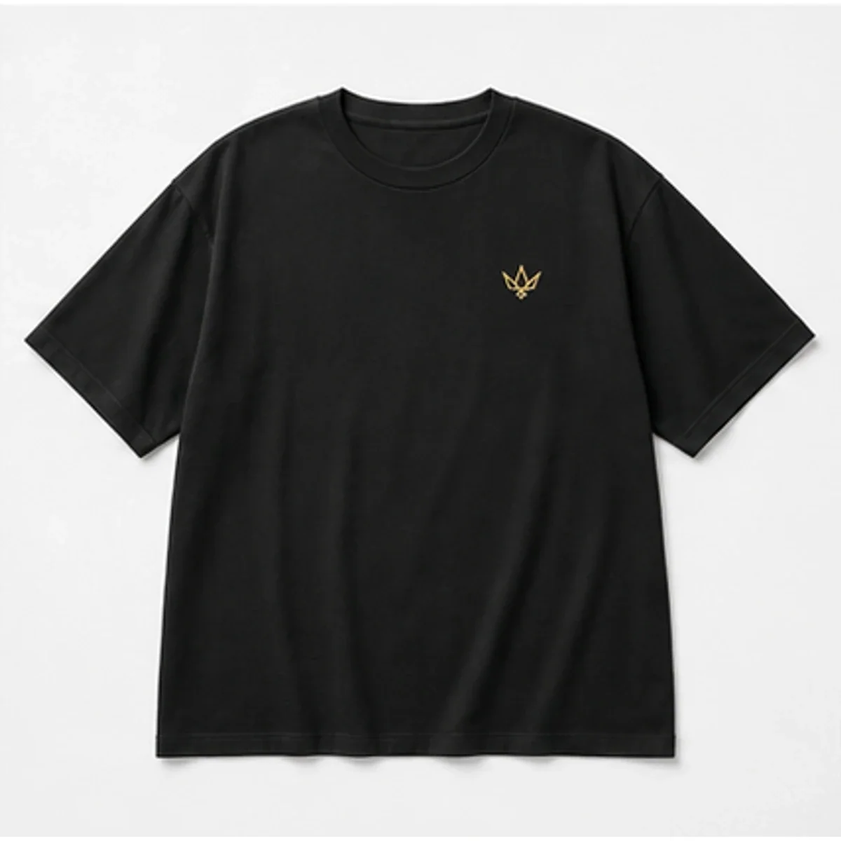 Black oversized Vannak Live T-shirt with a small gold emblem