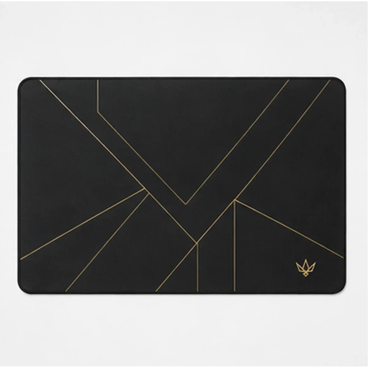 Wide black Vannak Live desk mat with a subtle gold line pattern